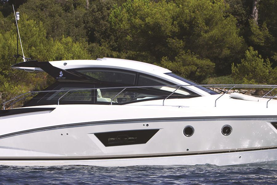 A Beneteau Gran Turismo 40 boat docked at water
