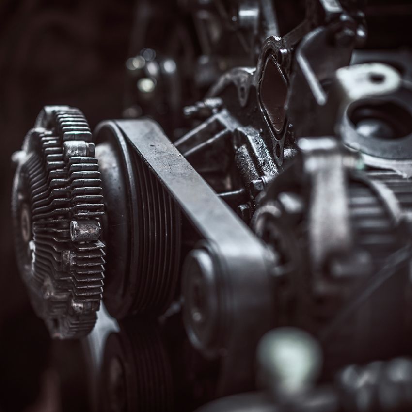 Detail of a boat engine being repaired with the maintenance service